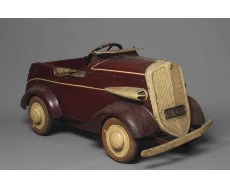 Lines Brothers vintage open tourer pedal car, pressed metal construction with maroon pin striped paint work, single hinged do