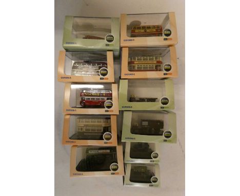 Eleven N scale Oxford Classic vehicles including buses, cars and wagons, all items boxed, mint