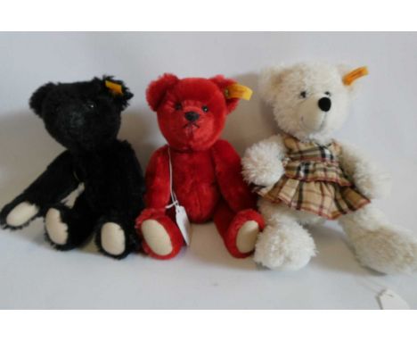 Three Steiff teddy bears including red and black bears with magnetic (interchangeable) joints, and a Lotte 28Condition Report