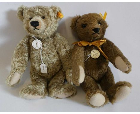 Two Steiff teddy bears, comprising a long haired Classic and a 1909 Classic growling bear, both approx. 13" and with ear butt