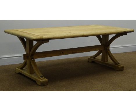 Light wood planked top coffee table, shaped supports joined by single stretcher on sledge feet, W130cm, H50cm, D70cm