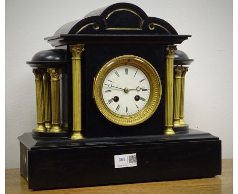 Victorian polished black slate mantel clock, temple shaped case with brass columns and white Roman dial, twin train movement 