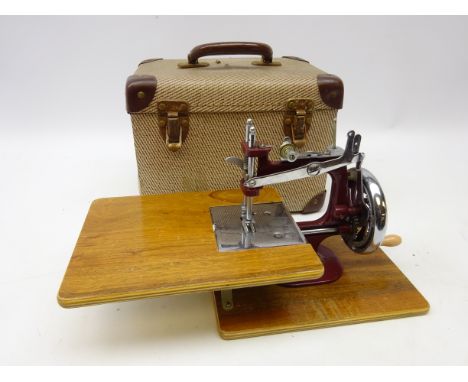 Vintage children's sewing machine in original case 
