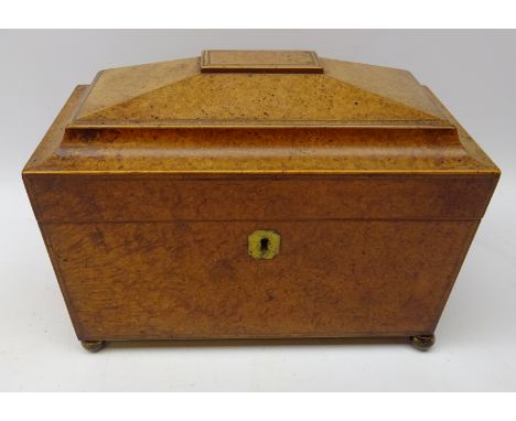 George III burr elm sarcophagus tea caddy, brass escutcheon &amp; feet, two moulded handles and lift out canisters with cross