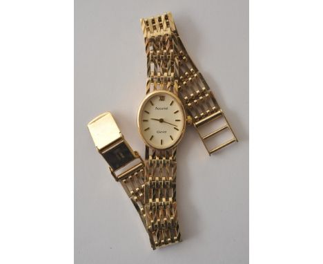 A ladies 9ct yellow gold Accurist wristwatch having gate bracelet type strap