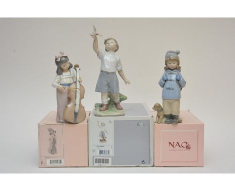 A boxed Lladro figure 'Flying Free' and two boxed Nao figures