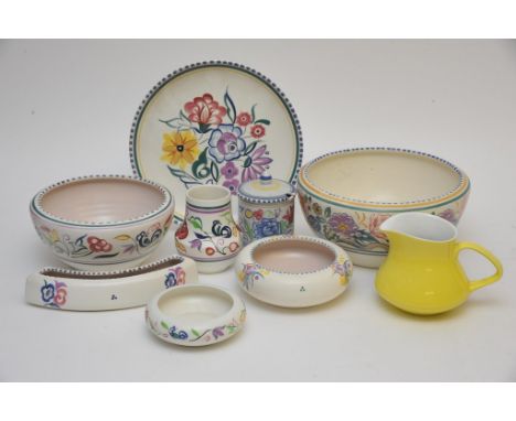 Nine examples of Poole pottery