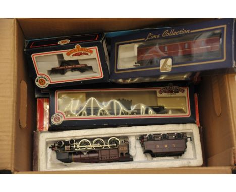 A collection of four model railway locomotives comprising a boxed Bachmann B.R. Class 4 4-6-0 Standard Loco, boxed Hornby R.3