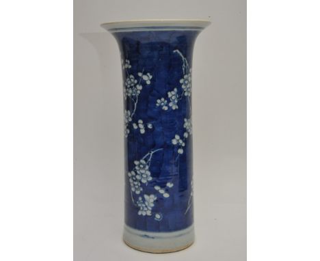 A large Chinese blue and white hat stand cylinder vase with flared rim decorated with cherry blossom. Height: 40cm approximat