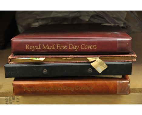 A large collection of stamps comprising two stamp albums,one book stamp album, two albums of First Day Covers and one bag of 