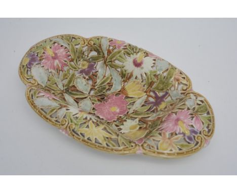 A Zsolnay Pecs pierced ceramic basket decorated with flowers and foliage