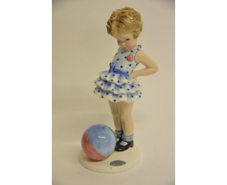 A Goldscheider figure of a young girl with a ball at her feet, signed G.Bouret to base. Approximately 22cm high.