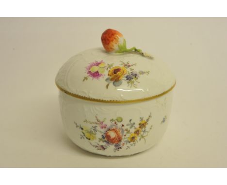 A porcelain jar and cover having finely floral detail and strawberry form finial.