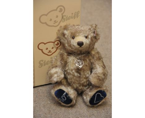 A Steiff Buckingham Bear limited edition having genuine mohair with box and certificate