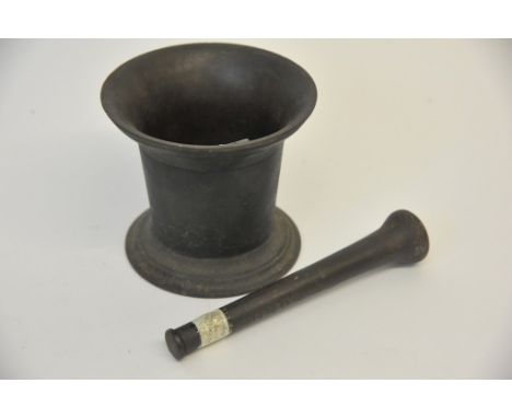 A Bronze molter and pestle