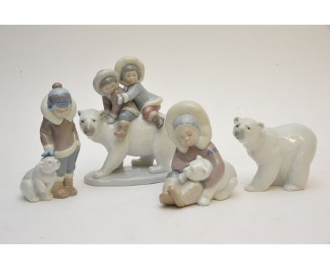 Four Lladro figures, Polar bears and Eskimos.