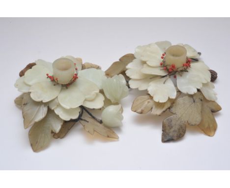 A pair of Chinese candlesticks in the form of foliate branches with carved hardstone and jade leaves and flowers 