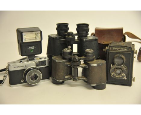 A cased Voightlander 'Brilliant' camera, one other and two pairs of binoculars