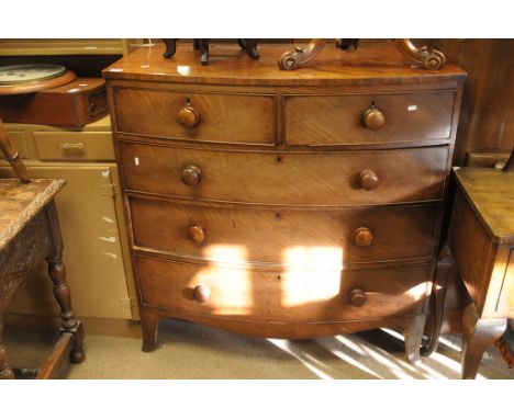 A Victorian bow fronted chest of drawers on bracket feet, fitted with two short and three long drawers.