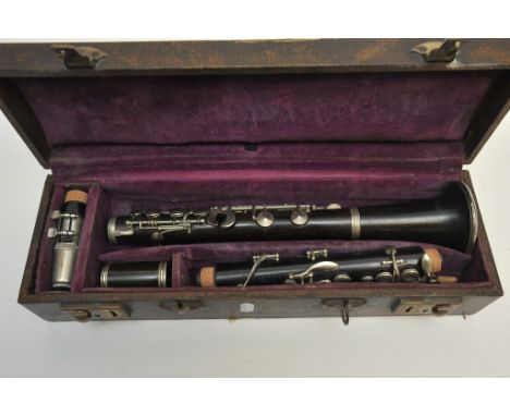 A cased console clarinet 