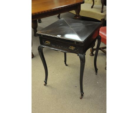 A mahogany envelope card table fitted with a single drawer on cabriole legs