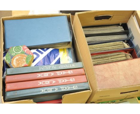 Two boxes containing a large collection of stamps in albums also including First Day Covers. 