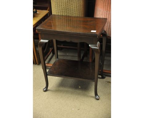 An Edwardian mahogany card table. 