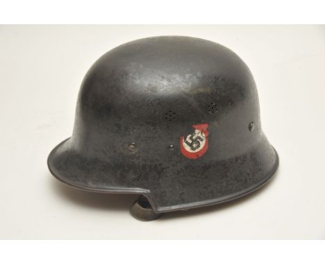 A German Third Reich black painted helmet with leather lining and swastika side decals