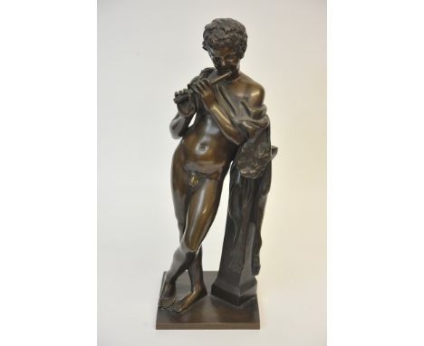 A fine quality French bronze of a Classical nude male playing the flute possibly Pan, from the foundry of Barbedienne impress