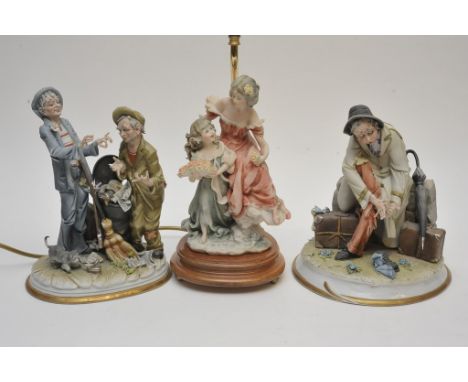 Two Capodimonte figures and a lamp