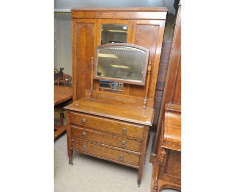 An oak mirrored wardrobe with conforming dressing chest