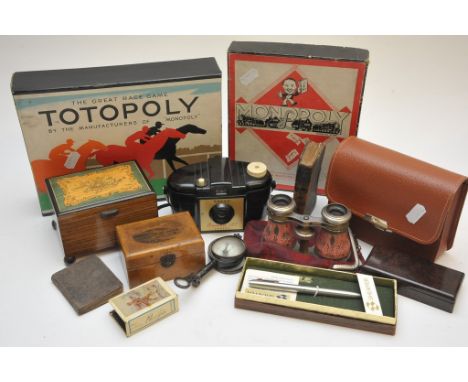 A collection consisting of monopoly game, totopoly, various boxes and other oddments. 