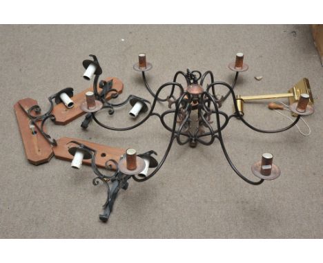 A large metal ceiling light and four wall lights