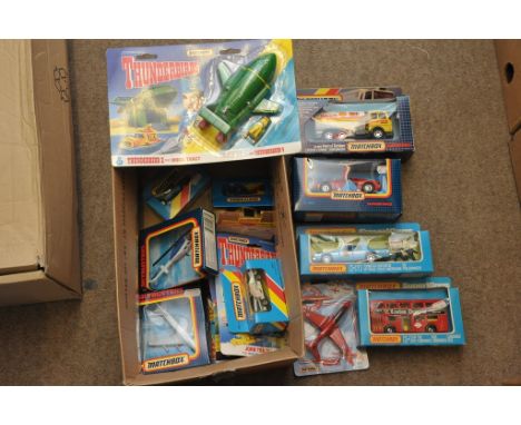 A Matchbox Thunderbird K-78, K-109, K-149, airplanes, and smaller boxed cars, all in original boxes