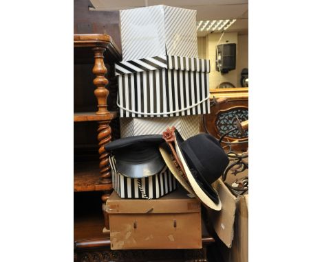 A collection of hats including some vintage