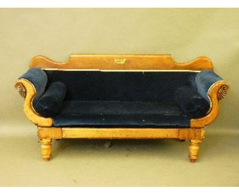 A Victorian walnut framed sofa, with blue velvet upholstery and ormolu decoration, 178cm wide