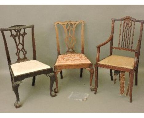 Two Chippendale style dining chairs, on claw and ball feet, and an Edwardian inlaid elbow chair, for restoration