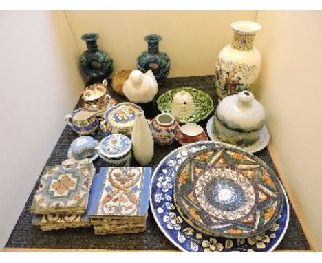 A quantity of ceramics, including a Goldscheider Wien dove, a Royal Worcester pot in the form of leaves, a collection of tile