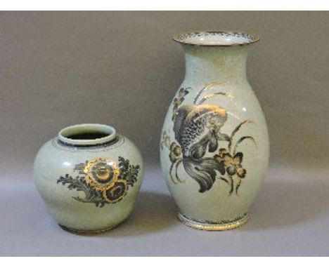 Two Royal Copenhagen crackle glaze vases, the baluster vase decorated with a lamp, the squat ogee vase with flowers