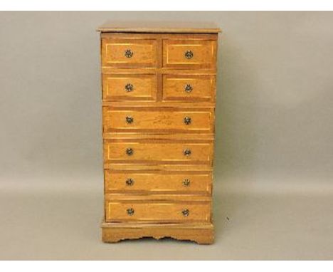 A cabinet, modelled as a chest of drawers, 59cm wide, a modern gilt barometer, and a toilet mirror