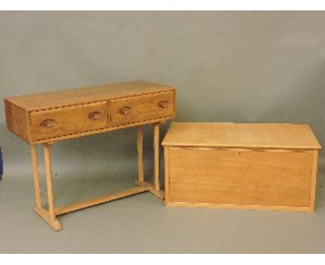 An Ercol elm two drawer side table, 107cm, and an Ercol blanket box, 108cm