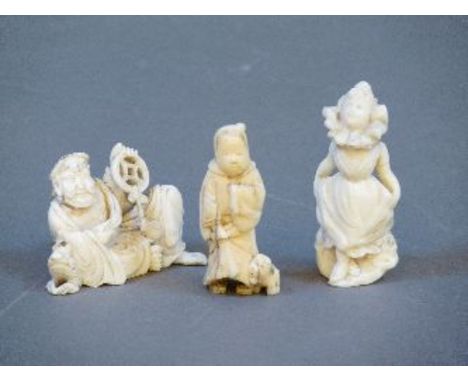 Two late 19th century Japanese ivory okimono, one of Gama Senin holding cash, his toad by his side, the other walrus ivory of