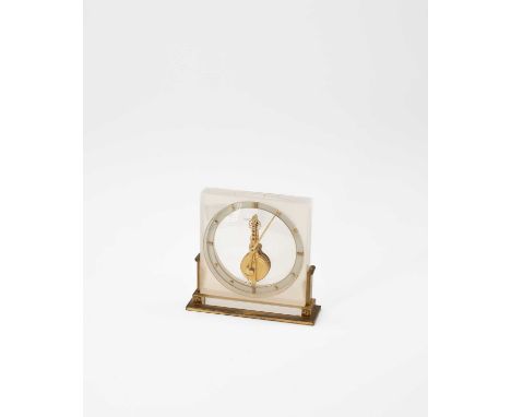 Jaeger LeCoultre: A mantel timepiece, the eight-day movement with inline lever escapement, in a square perspex case on a bras