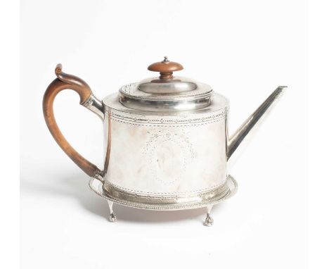 A George III silver teapot and stand, Hester Bateman, London 1785, of oval shape, the teapot with tapering spout, fruitwood f