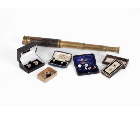 A Victorian miniature compass set in a cube of banded agate, a threefold leather and brass telescope, a pair of 9ct gold dres