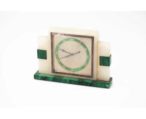 An onyx and malachite mantel timepiece, the machined silvered dial signed Finnigans, green enamel chapter ring, Swiss eight-d