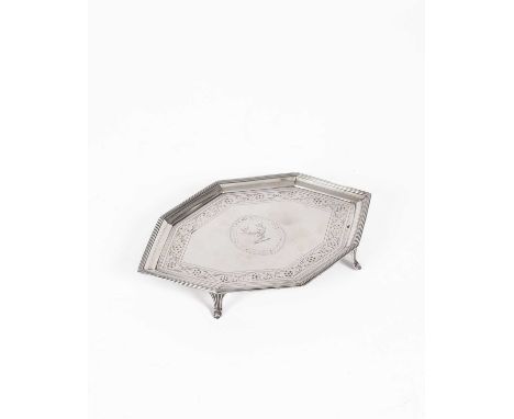 A George III silver teapot stand, Peter &amp; Ann Bateman, London 1972, of lozenge-shape with engraved decoration and crest, 