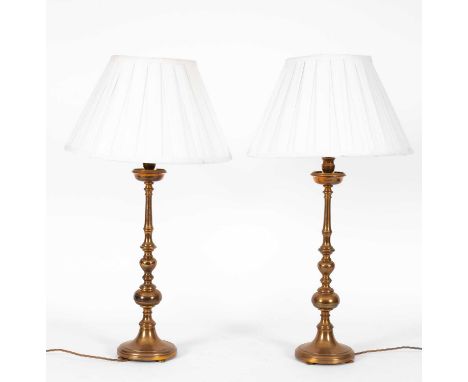 A pair of Grafton table lamps supplied by Robert Kime, with pleated fabric shades above turned candlestick bases, 74cm (inclu