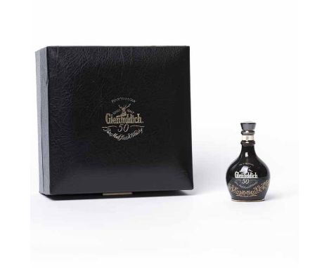 GLENFIDDICH 50 YEAR OLD MINIATURE
Single Highland Malt Whisky, 5cl, no strength stated, in black ceramic decanter, in present