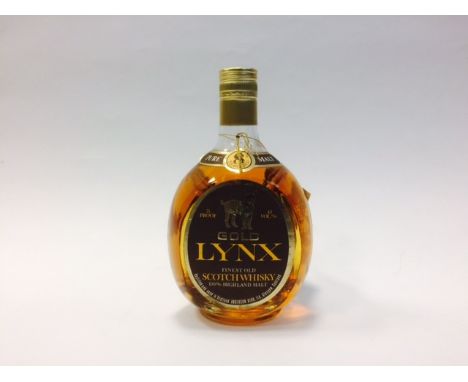 AMENDED DESCRIPTION
GOLD LYNX Blended Malt Scotch Whisky. Full size bottle, no capacity stated. 75° proof.